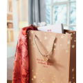 Sac cadeau en papier &agrave; motifs Or